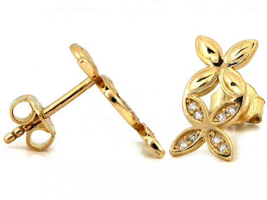 Złote kolczyki dwa kwiatki na sztyfcie przy uchu