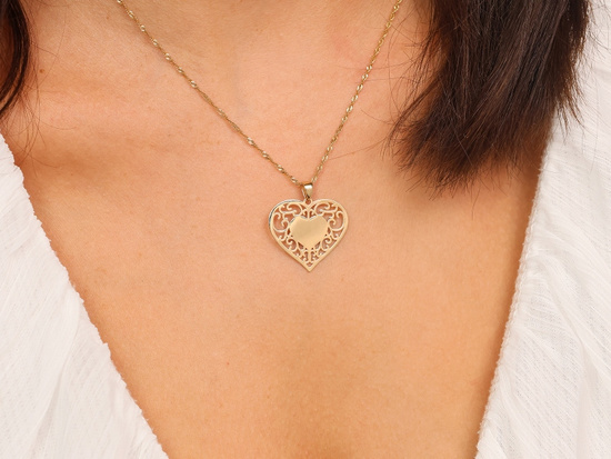 Złota ażurowa zawieszka serce