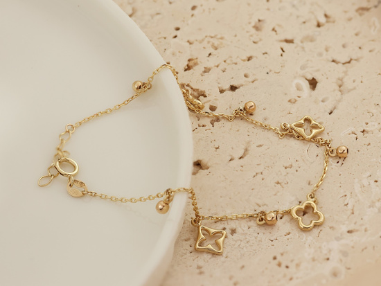 Bransoletka złota z zawieszkami z kuleczkami