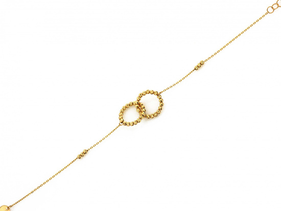 Złota bransoletka dwie obrączki i kuleczki