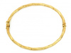 Bransoletka złota sztywna bangle skręcona