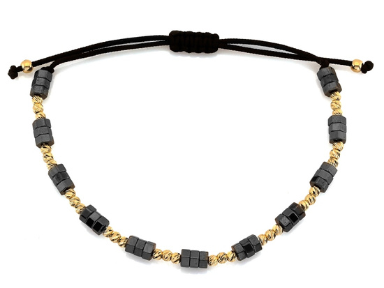 Bransoletka hematyty i złote kulki na czarnym sznurku