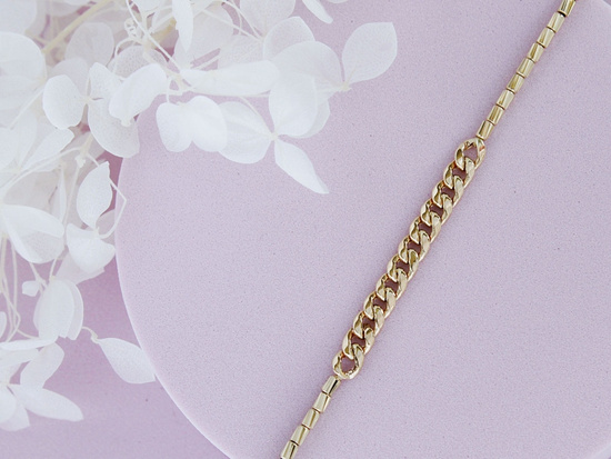 Elegancka złota bransoletka z łączonych łańcuszków