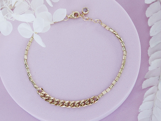 Elegancka złota bransoletka z łączonych łańcuszków