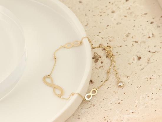 Bransoletka złota z kuleczkami i nieskończonością