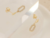 Kolczyki złote delikatne wiszące na sztyfcie owalne