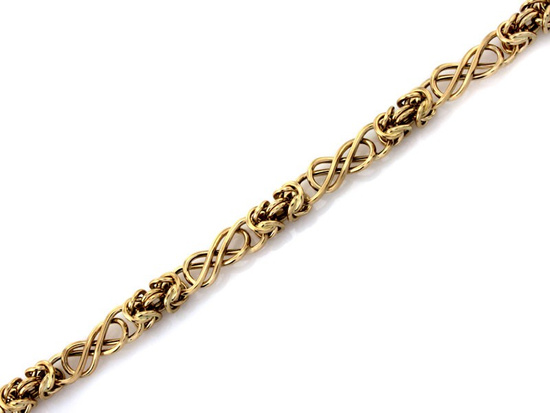 Złota bransoletka z elementami splotu królewskiego