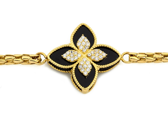 Modna złota bransoletka gruba z modnym czarnym kwiatkiem