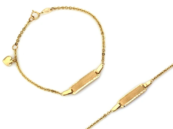 Złota bransoletka dla dziecka z blaszką pod grawer i serduszkiem