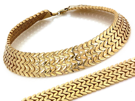 Złota bransoletka szeroka błyszcząca taśma z ruchomych elementów