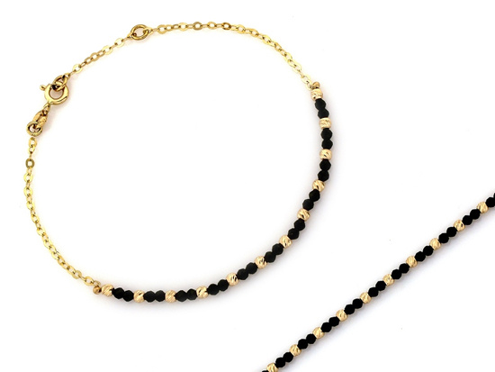 Złota delikatna bransoletka z kuleczkami i czarnymi kamieniami