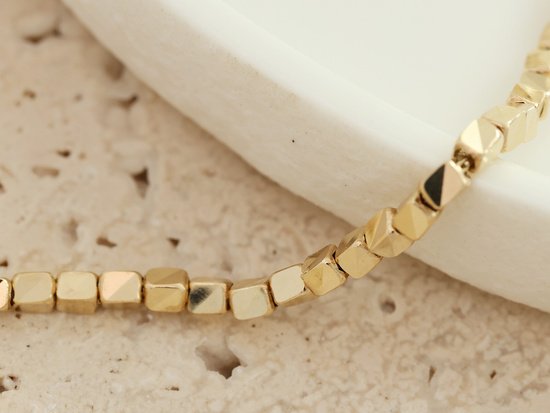 Bransoletka złota z małych kostek