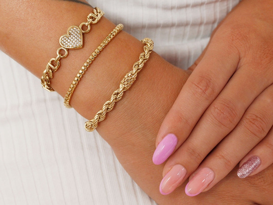 Złota bransoletka z walcowatych elementów