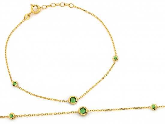 Złota bransoletka z zielonymi cyrkoniami