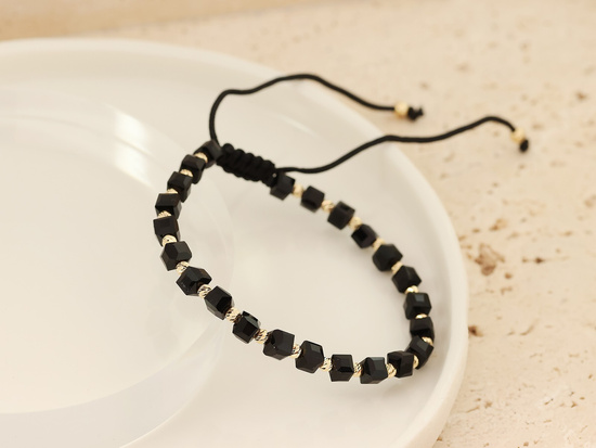 Bransoletka złota czarna sznurkowa ze złotych kulek i czarnych kostek