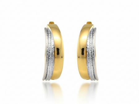 Dwukolorowe kolczyki złote przy uchu