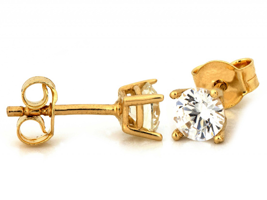 Kolczyki złote z cyrkonią na sztyfcie przy uchu