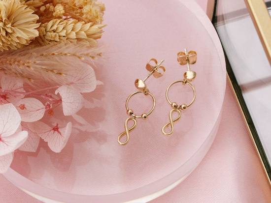 Kolczyki złote wiszące na sztyfcie z nieskończonością