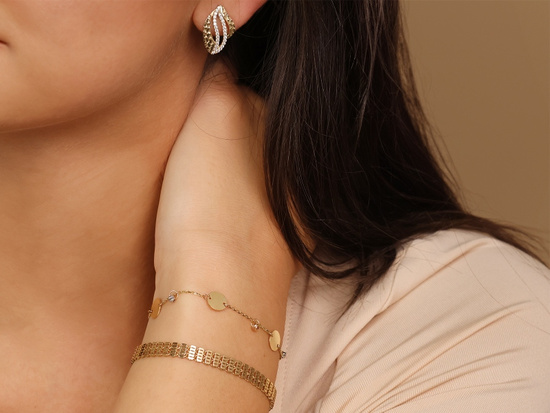 Bransoletka złota taśma z ruchomych elementów