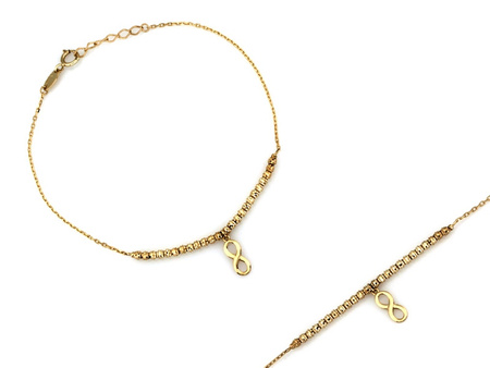 Złota bransoletka z kulkami i wiszącą nieskończonością