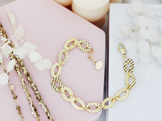 Złota bransoleta owalne błyszczące elementy