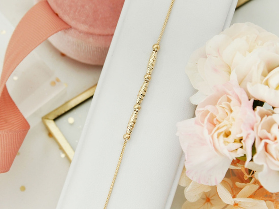 Elegancka złota bransoletka z kulkami dyskretna subtelna