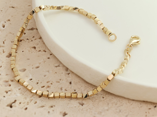 Bransoletka złota z małych kostek
