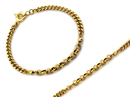 Bransoletka złota z kulkami z łączonych łańcuszków