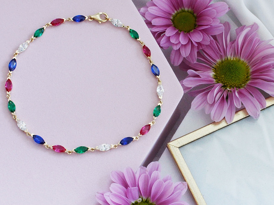 Złota bransoletka z kolorowymi cyrkoniami