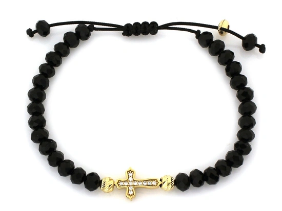 Bransoletka złota z krzyżykiem i czarnymi kulkami onyksami
