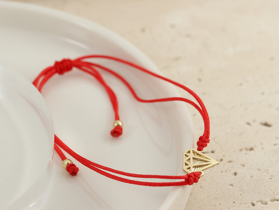 Bransoletka złota diament graficzny na czerwonym sznurku