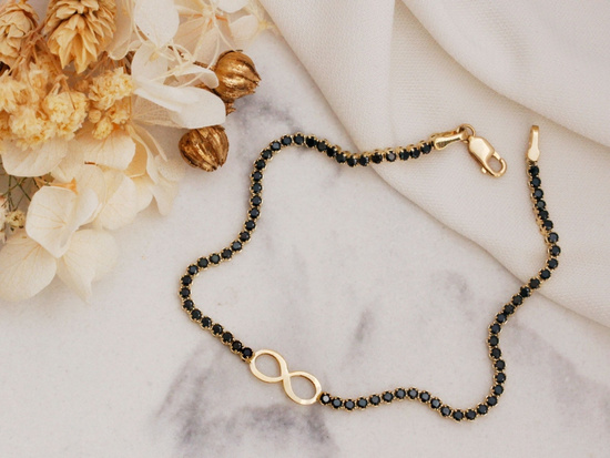 Złota bransoletka delikatna z czarnymi cyrkoniami z nieskończonością