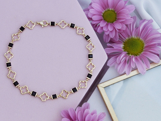 Bransoletka złota modny motyw kwiatek koniczynka czarne kamienie