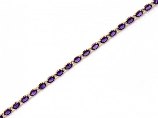 Bransoletka złota z fioletowymi owalnymi cyrkoniami