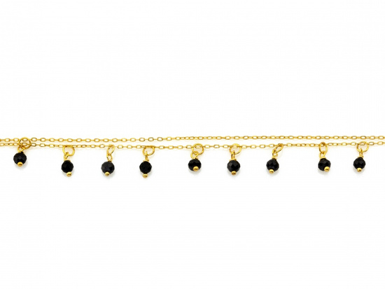Bransoletka złota z wiszącymi czarnymi onyksami