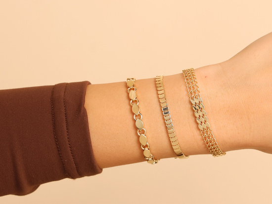 Bransoletka złota taśma z gładkich błyszczących elementów