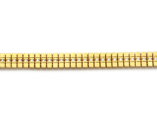 Złota bransoletka z małych kwadracików z cyrkoniami