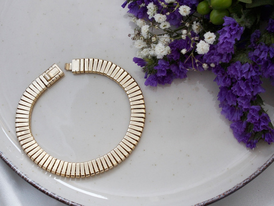 Złota bransoletka ruchoma taśma błyszcząca efektowna