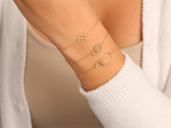 Bransoletka złota celebrytka z dwoma sercami