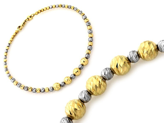 Złota bransoletka z diamentowanymi kulkami