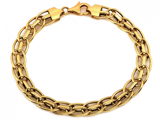 Gruba złota bransoleta damska z przeplatanych ogniw