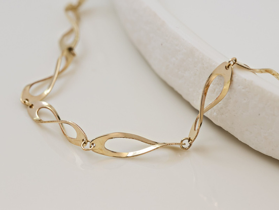 Bransoletka złota duże skręcone ogniwa