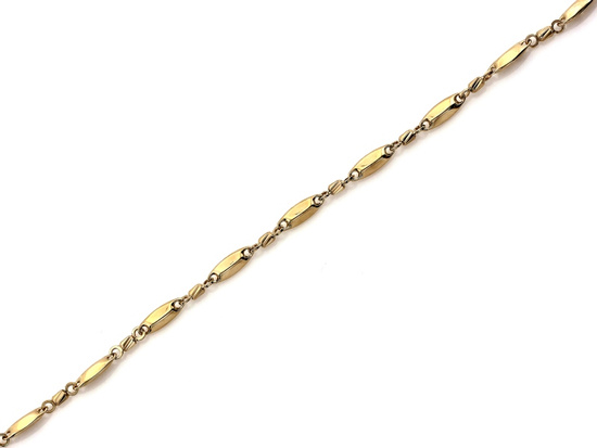 Bransoletka złota z podłużnych błyszczących elementów