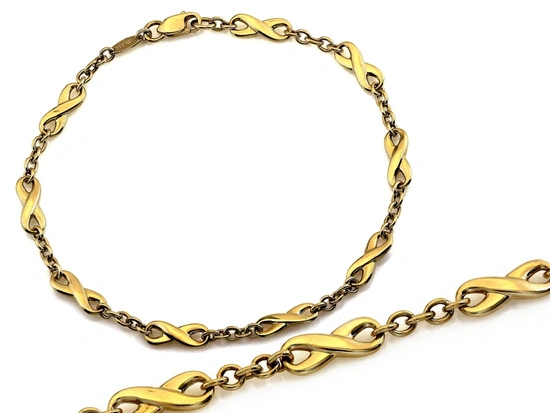 Złota bransoletka elementowa z nieskończonościami