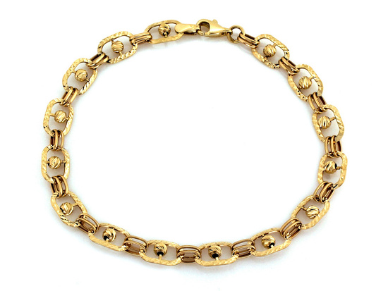 Bransoletka złota delikatne błyszczące elementy z kulkami