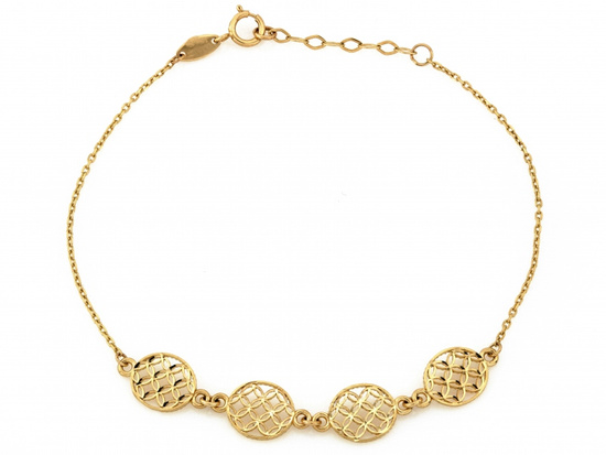 Złota bransoletka łańcuszkowa z kilkoma okrągłymi elementami