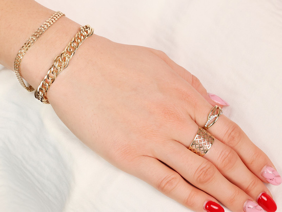 Złota bransoletka taśma z ruchomych elementów