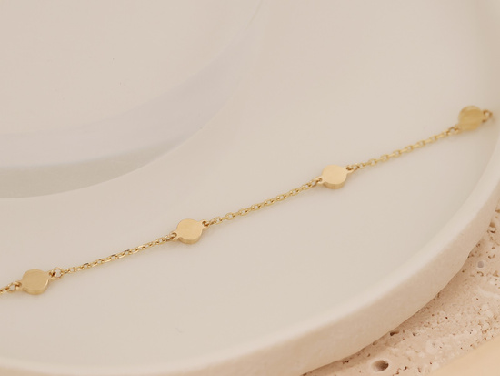 Złota bransoletka łańcuszkowa z małymi kółeczkami blaszkami