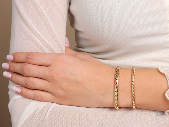 Złota bransoletka elegancka elementowa