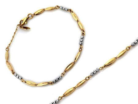 Delikatna złota bransoletka z białymi kulkami